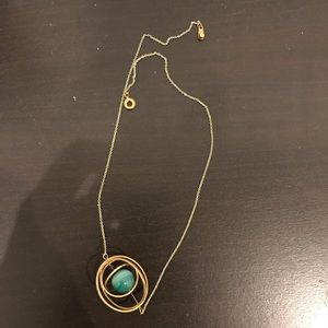 Spinning orb necklace